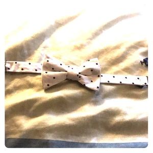 White with black polka dots express now tie